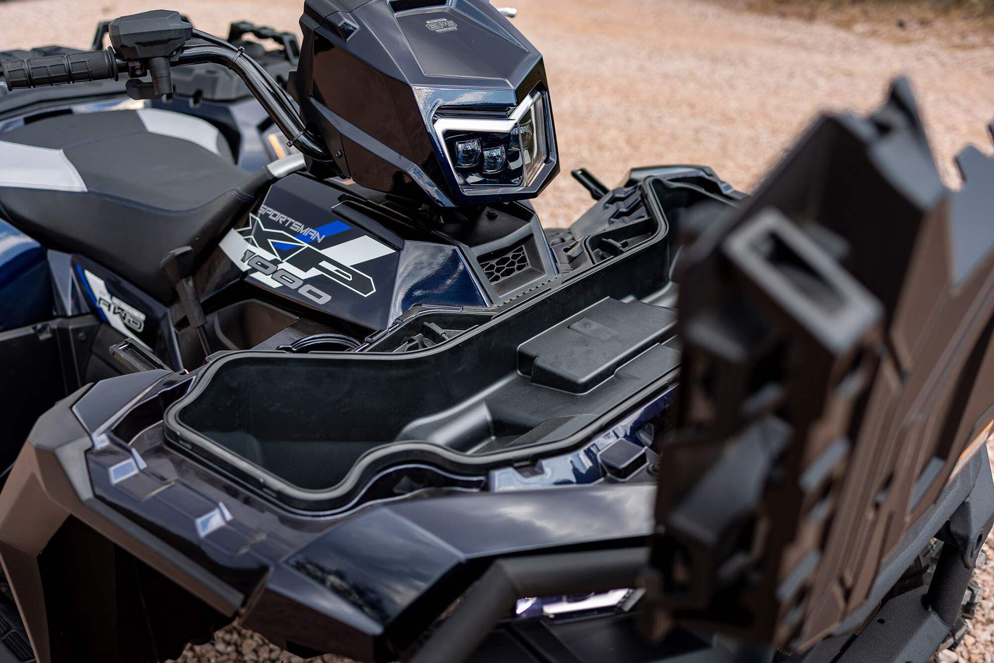 There are 6 gallons of personal storage space under the racks.