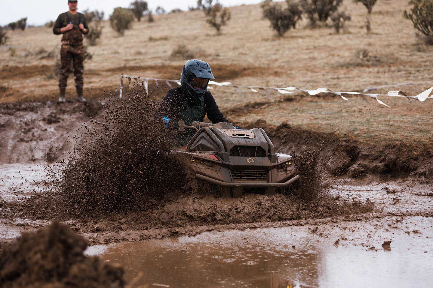 Even buried to its fenders in slop, the Outlander stays composed and keeps on pulling.