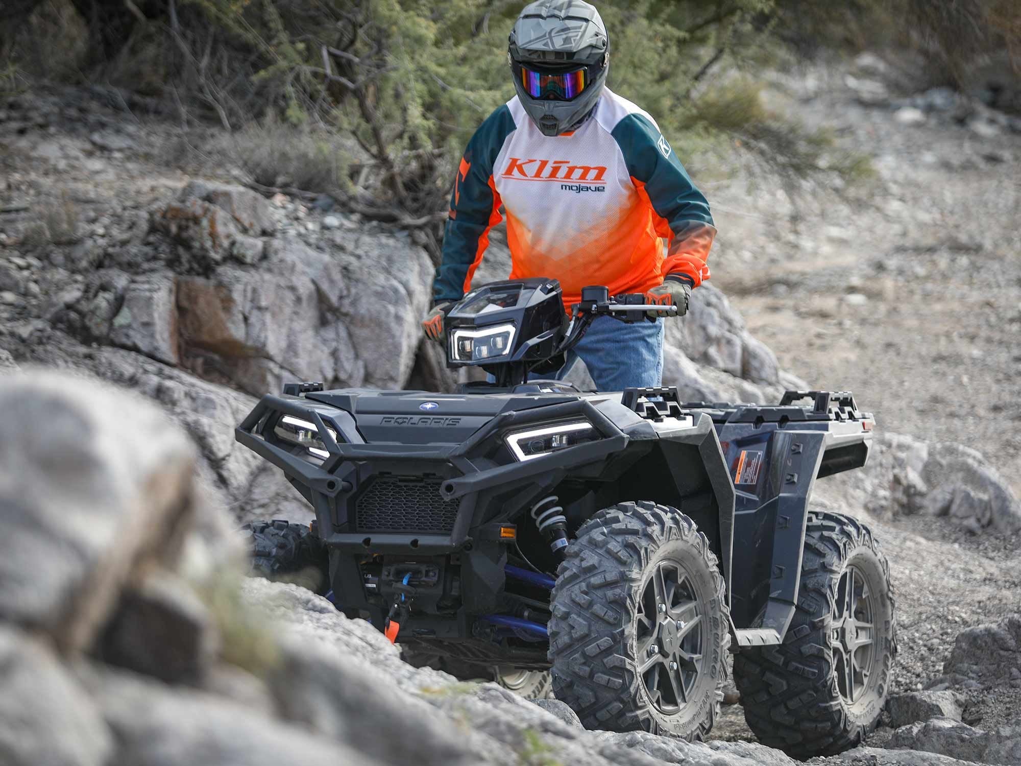 The Sportsman XP 1000 is a mountain goat on the rocks.